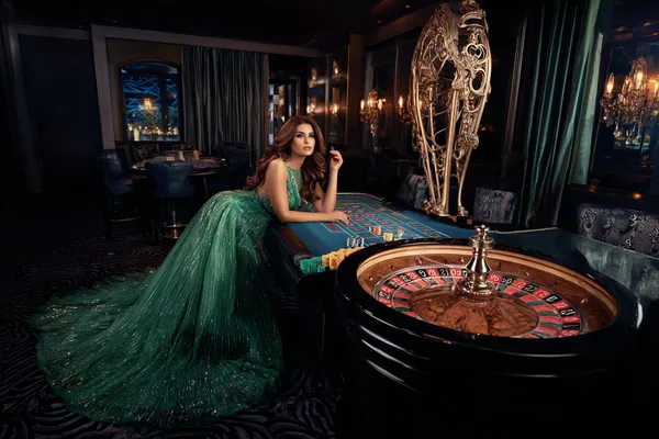 MC888 Mobile App — Your complete hub for casino and sports A man focused on his laptop with live stats in the background, highlighting the dedicated sports and gaming features of the MC888 mobile app.