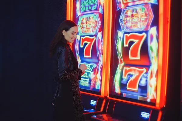 A woman in a luxurious green gown next to an ornate roulette wheel, capturing the upscale casino mood of MC888.